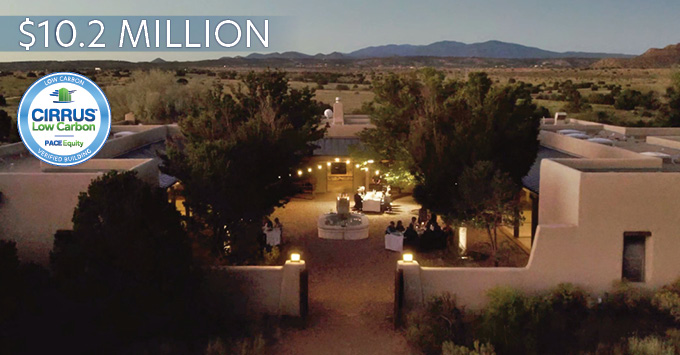 Retreat center at night exterior with "$10.2 Million" in corner